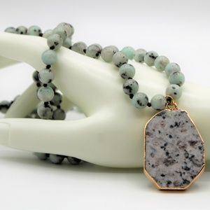 Long knotted jasper necklace and pendant